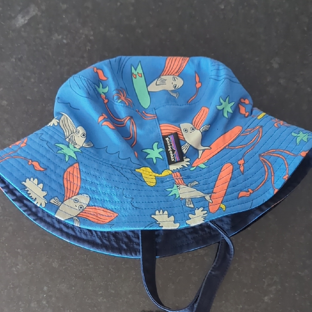 Patagonia Blue Bucket Hat with Cartoon Design